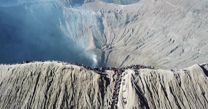 Mountain Bromo active volcano crater in East Jawa, Indonesia. Top view from drone fly. 4K footage