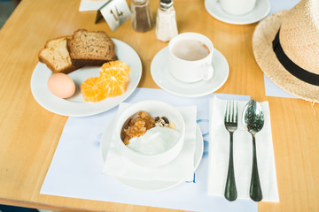 morning breakfast, muesli with yoghurt, eggs
