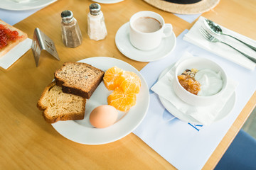 morning breakfast, muesli with yoghurt, eggs