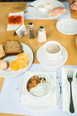 morning breakfast, muesli with yoghurt, eggs