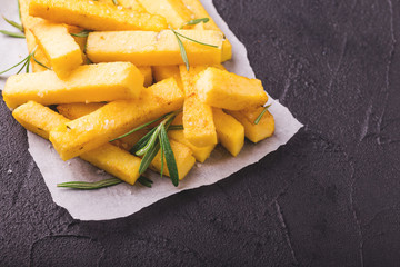Polenta fries with rosemary. Italian appetizers. Top view.