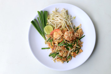 Thai food Pad Thai ,Stir fry noodles with shrimp in white plate. The one of Thailand's national main dish. the popular food in Thailand. Thai Fried Noodles.