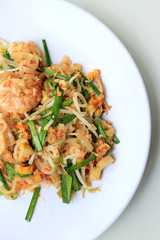 Thai food Pad Thai ,Stir fry noodles with shrimp in white plate. The one of Thailand's national main dish. the popular food in Thailand. Thai Fried Noodles.