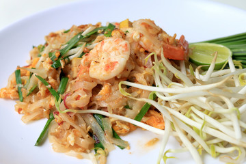 Thai food Pad Thai ,Stir fry noodles with shrimp in white plate. The one of Thailand's national main dish. the popular food in Thailand. Thai Fried Noodles.