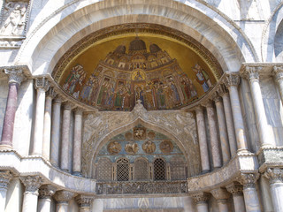 Obraz premium Fragment of door decoration of basilica San Marco Venice, Italy with mosaic