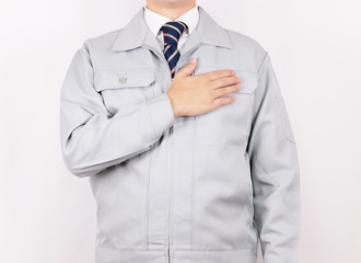 作業着 男性 ネクタイ ポーズ お任せ下さい