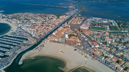 Aerial top view of beach resort town on Mediterranean sea from above, vacation and tourist holiday destination in France
