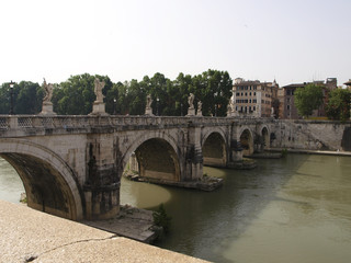 Fototapeta na wymiar Ponte or bridge Sant'Angelo over river Tiber in Rome, Italy