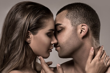 Beauty portrait of kissing couple.