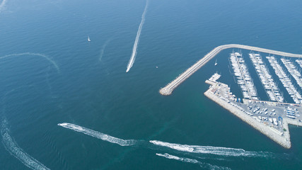 Fototapeta premium Aerial top view of boats and yachts in modern marina from above, Mediterranean sea, South France 