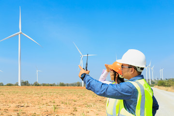 Engineers working on wind turbines.