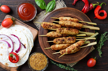 Lula-kebab is a traditional Caucasian meat dish. Chopped fried meat on skewers. Turkish cuisine.