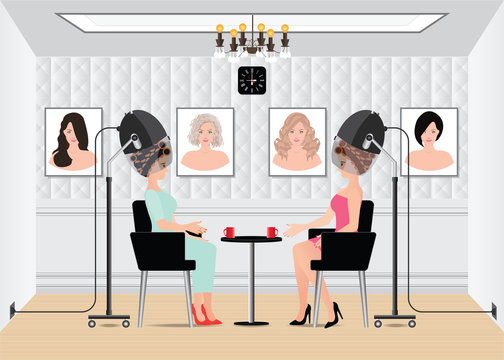 Women Waiting For While Drying Under Hairdryer In Beauty Salon.