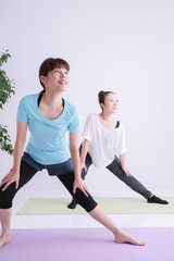 Obraz premium ストレッチする女性 