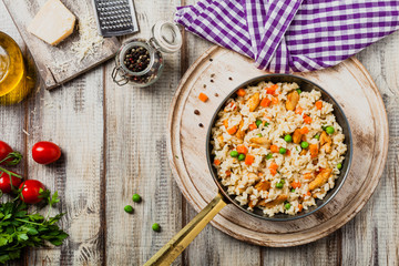 Delicious risotto with chicken and green peas.