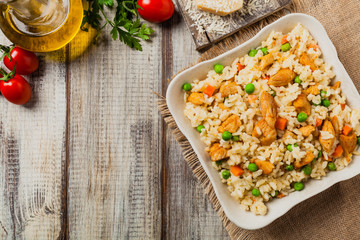 Delicious risotto with chicken and green peas.