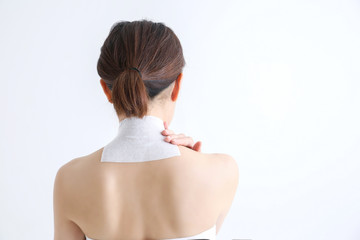 肩こりの女性
