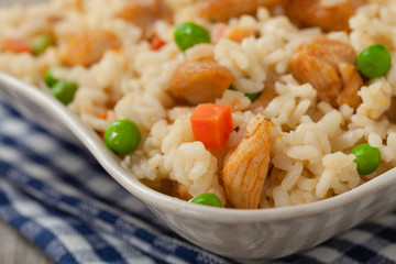 Delicious risotto with chicken and green peas.