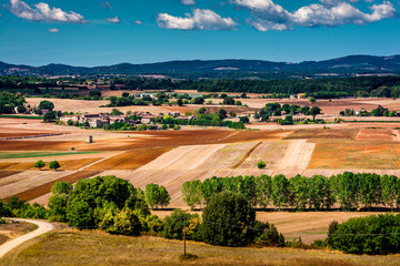 Fototapeta na wymiar Beautiful landscape view of Monteriggioni commune from the walls of Monteriggioni town in in Tuscany, Italy