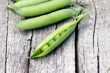 Delicious pea pods on the old Board