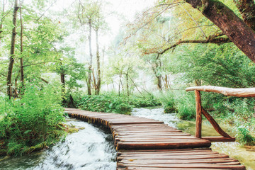 Plitvice Lakes National Park, tourist route on the wooden flooring along the waterfall