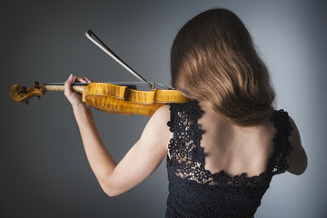 Portrait of a girl playing the violin