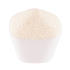 Semolina in white bowl, closeup, isolated. Template for menu, cover, advertising.