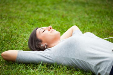 Relaxed woman listening music