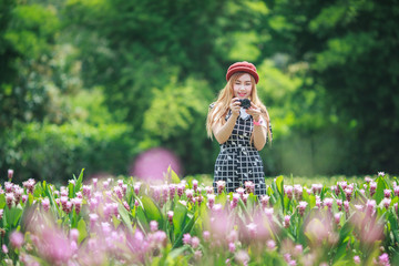 Beautiful girl Taking Photo by mirrorless camera
