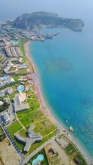 August 2017: Aerial drone photo of famous pools and 5 star resorts - hotels at small village of Kolympia bay, Rhodes island, Aegean, Dodecanese, Greece