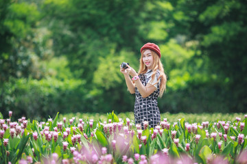 Beautiful girl Taking Photo by mirrorless camera