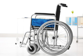 Wheelchair in light room. Elderly care concept