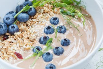 smoothie bowl with granola and berries.