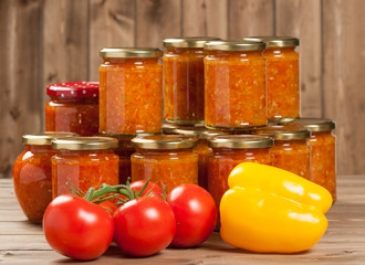 Homemade Preserve With Sweet And Hot Peppers, Tomatoes, Garlic, Carrots. Traditional Adjika Dip.