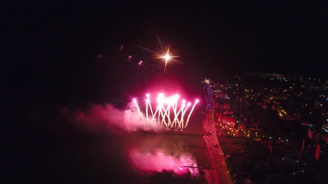 Night view of the fireworks above the city promenade