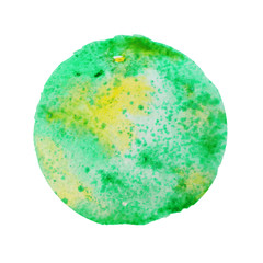 Green watercolor paint in shape of circle on white background