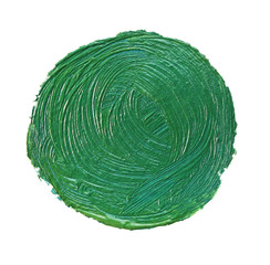 Green oily paint in shape of circle on white background