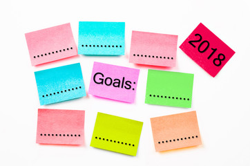 colorful sticky note paper with Goals 2018.