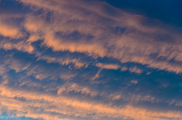 Fototapeta na wymiar Fluffy clouds at sunset