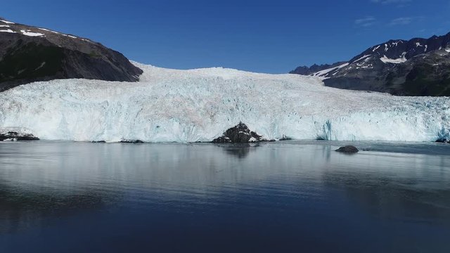 Arial 4k shots of a glacier and it's surroundings in Alaska