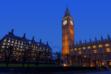 Fototapeta na wymiar Night View of the Palace of Westminster, Big Ben and Portcullis House in Westminster, England, UK