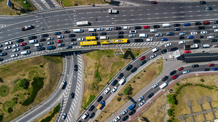 Aerial top view of road junction from above, automobile traffic and jam of many cars, transportation concept
