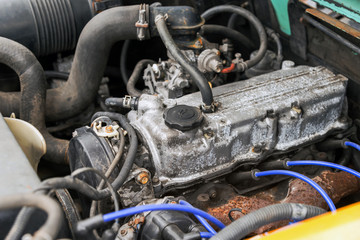 detail of old forklift engine in the garage