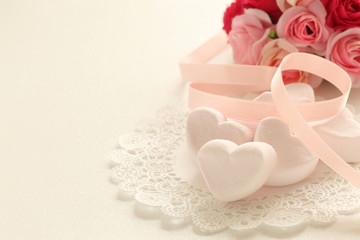 heart shaped marshmallow and artificial flower