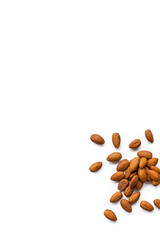 beautiful pile of roasted organic almonds with the peel isolated on a white background. Vertical composition. Top view