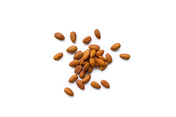 beautiful pile of roasted organic almonds with the peel isolated on a white background. Horizontal...