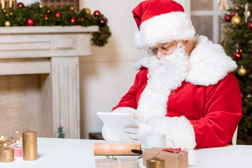 santa claus using tablet