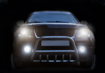 SUV isolated on a dark background