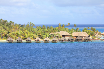 Water bungalows on Bora Bora island - obrazy, fototapety, plakaty