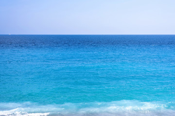 Fototapeta na wymiar Beautiful daylight view to blue water of Nice Cote d'Azur, France.